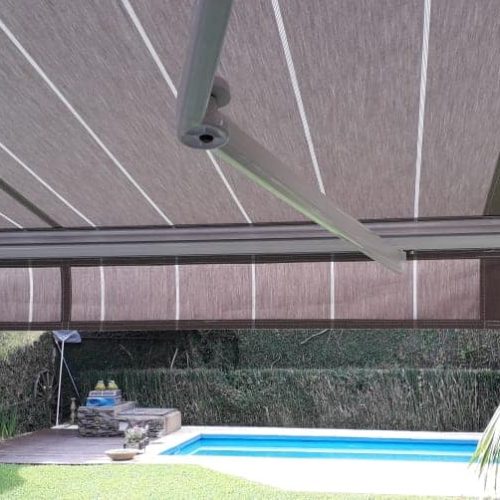 Toldo brazo invisible