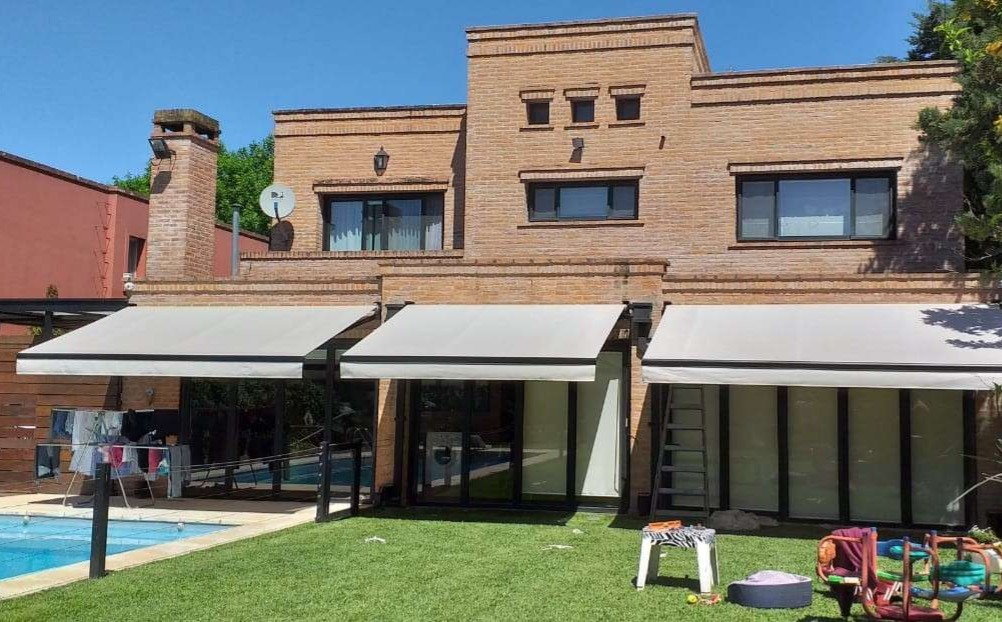 Toldo brazo invisible para galería